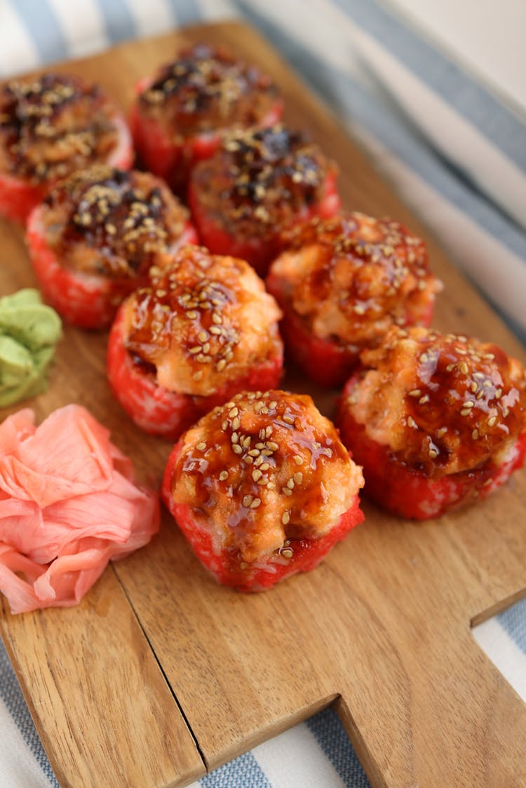 Stuffed Tomatoes With Sesame On Cutting Board