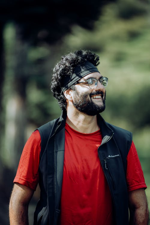 Smiling Man in Eyeglasses and Red T-shirt