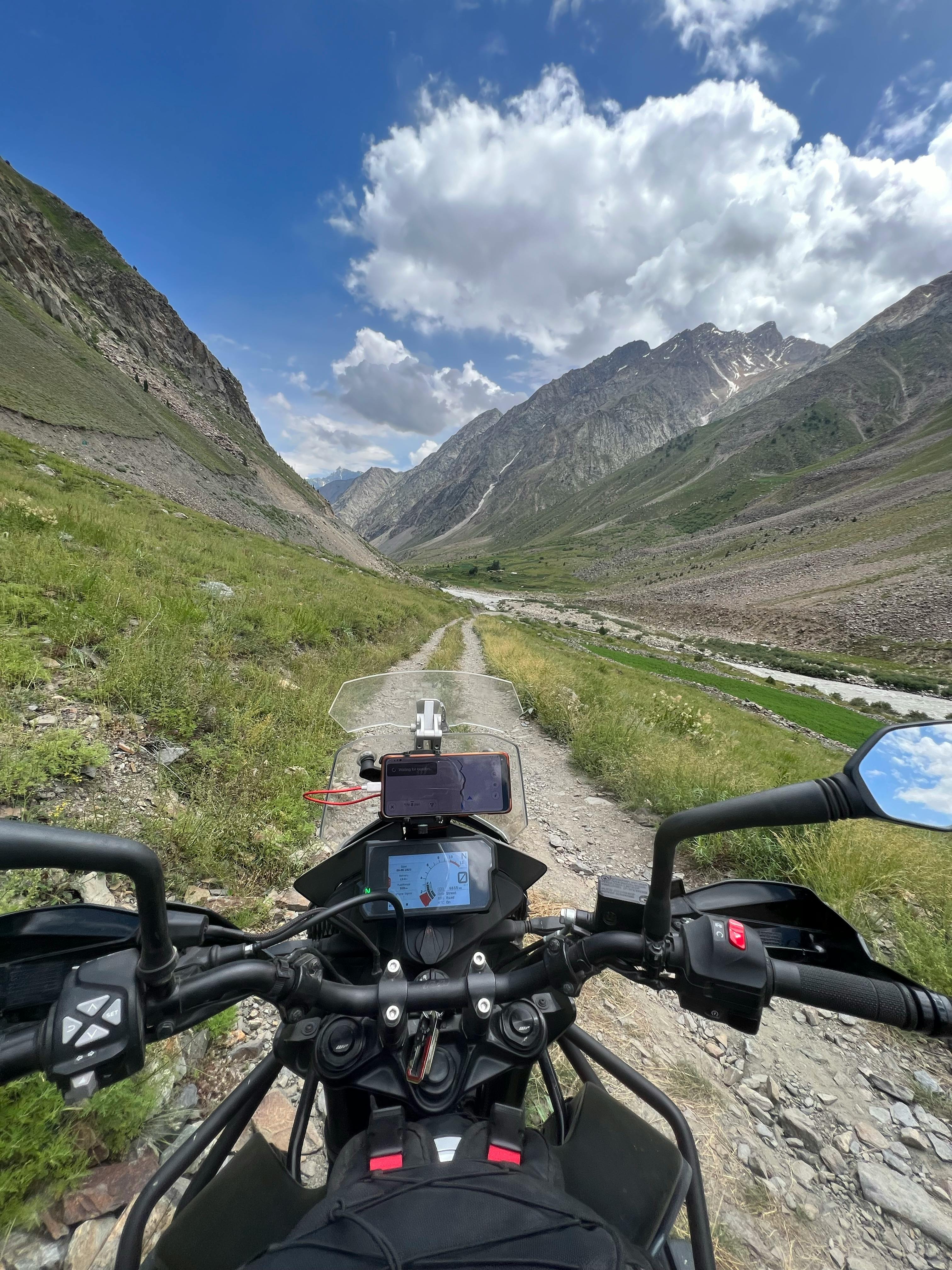 Motorbike on a Road in the Mountains Free Stock Photo