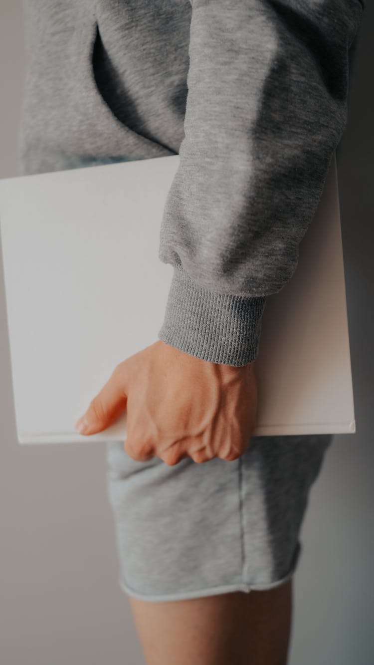 Man Holding A Book