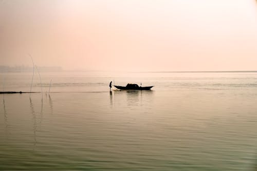 Δωρεάν στοκ φωτογραφιών με βάρκα, δύση του ηλίου, θάλασσα