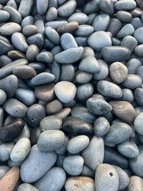 Close-up of Smooth Pebbles on the Beach 