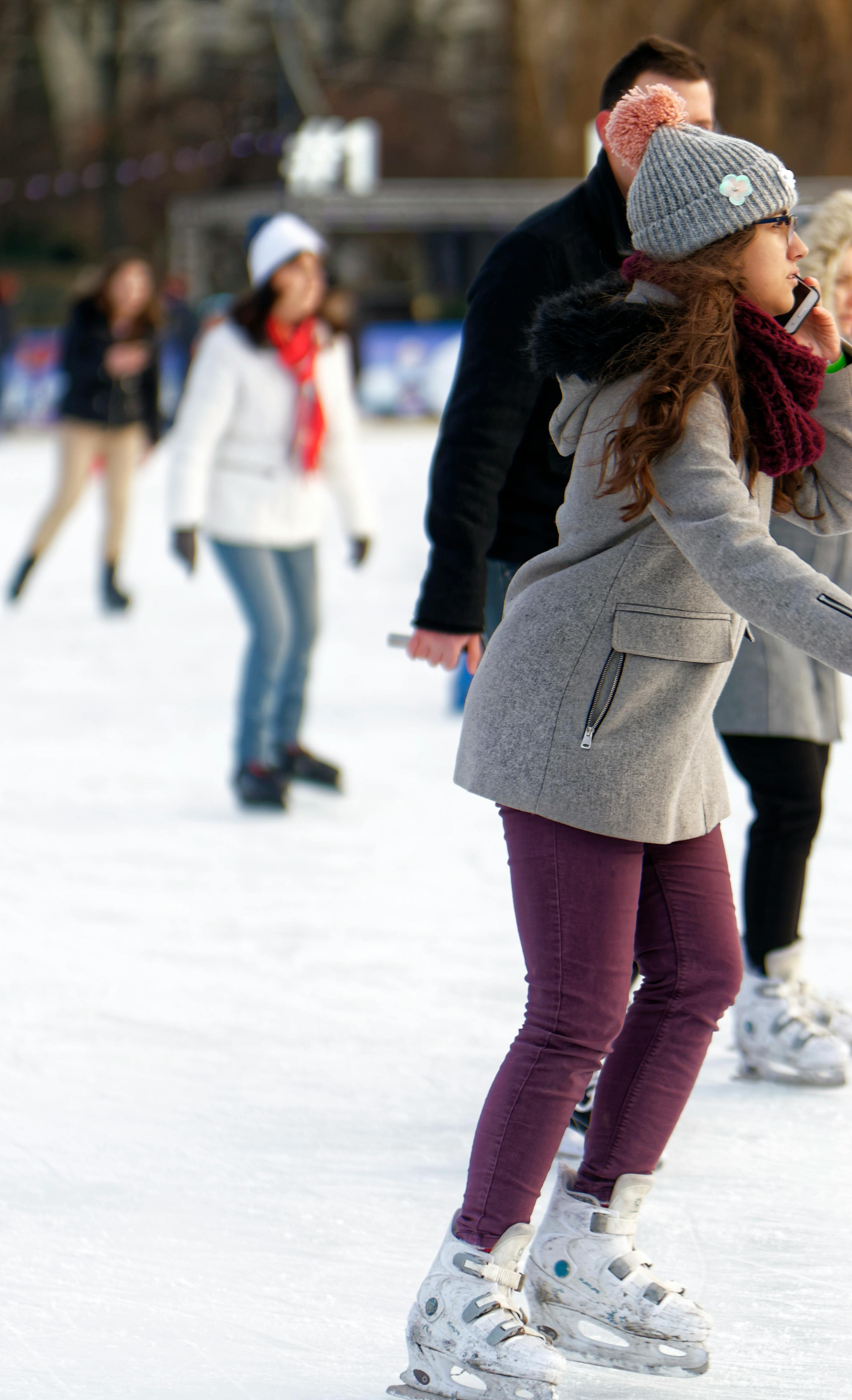 Free stock photo of ice skating rink, people skating, winter