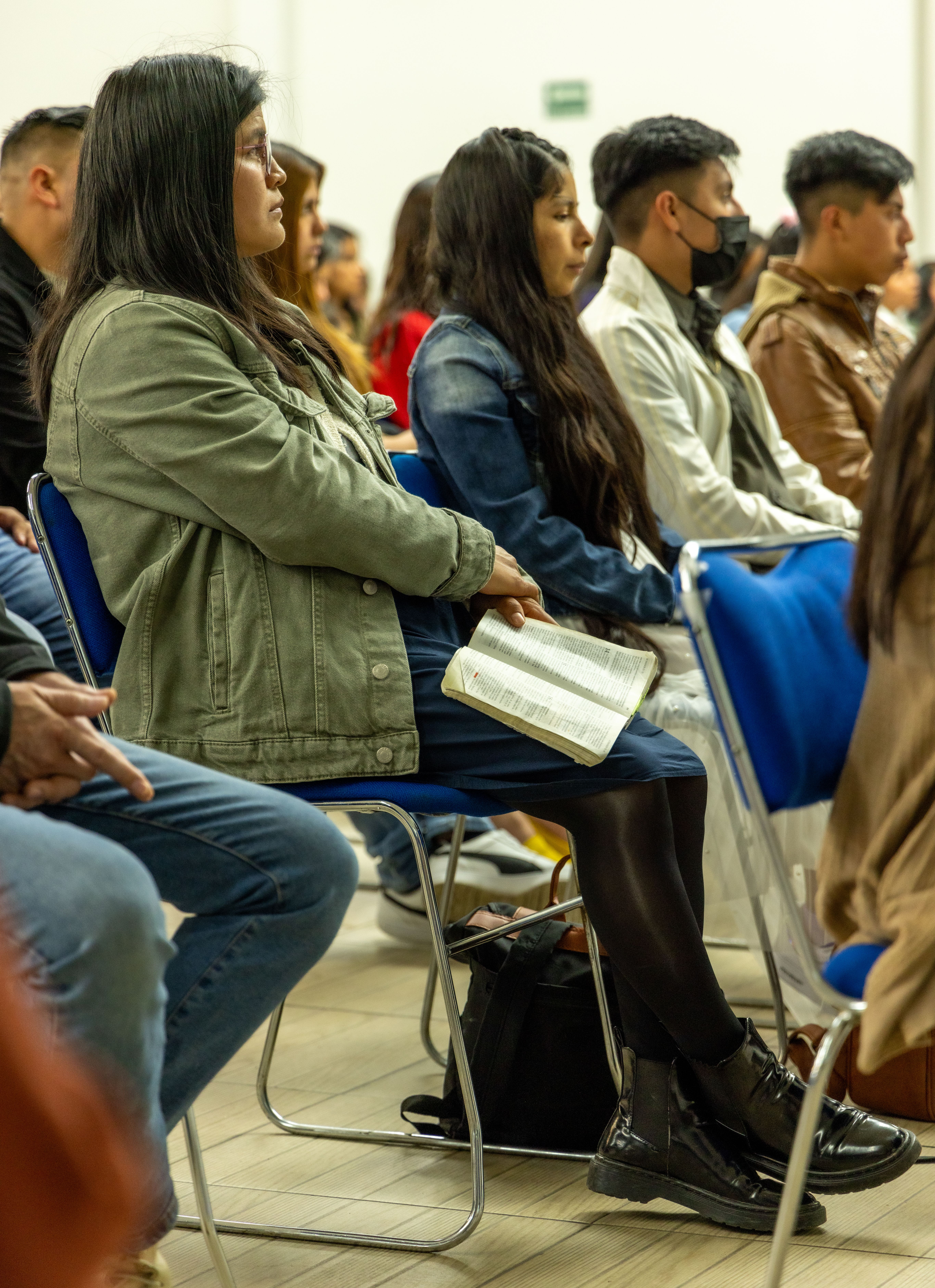 Neighbours seated together at a community meeting — Israel Torres on Pexels