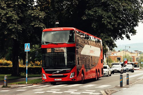 Red Volvo 9700 Double Decker in Front of a Crosswalk