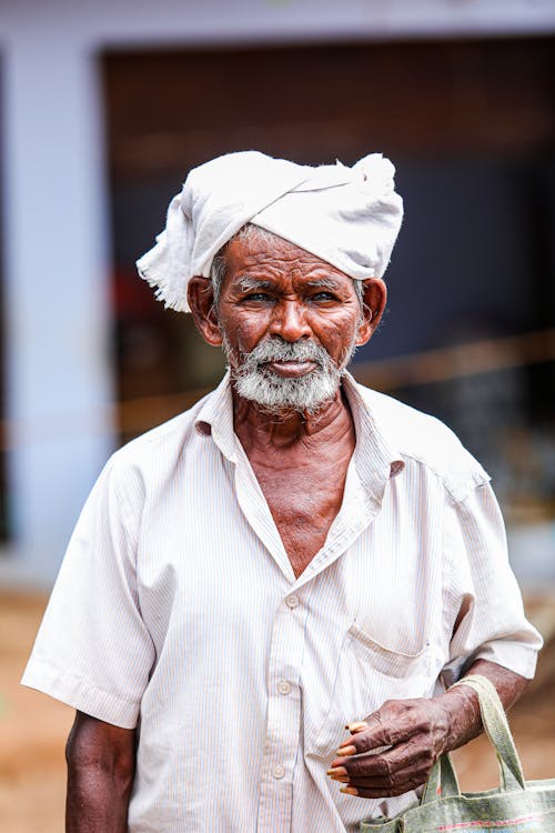 Elderly Man in Shirt and Shawl on Head