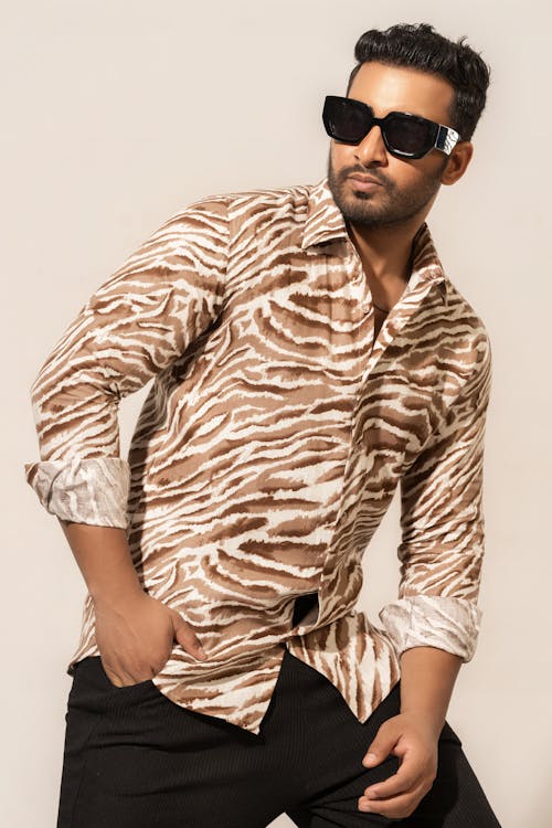 Man in Printed Brown and White Shirt