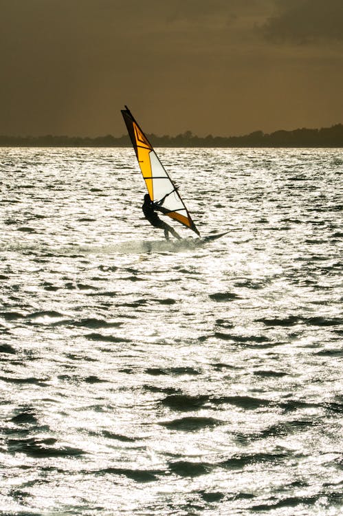 Person Wing Foiling on Sea