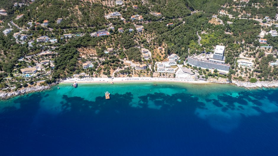 Ultimate Santorini 30min Helicopter Tour Review: Soaring Above Greece's Most Iconic Island Review 2026 - Stunning aerial view of Corfu coastline with azure waters and lush landscapes, perfect for vacation vibes.