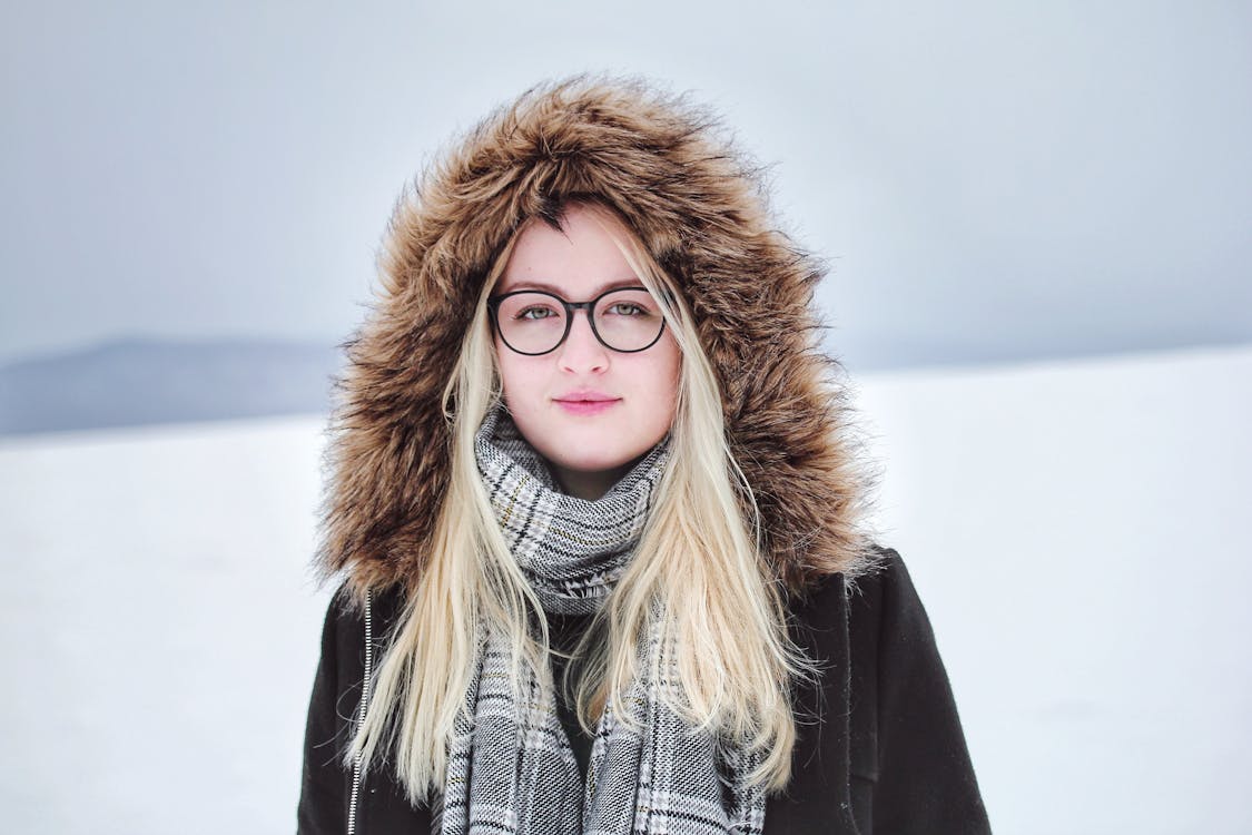 Free Women's Black and White Fur Jacket Stock Photo