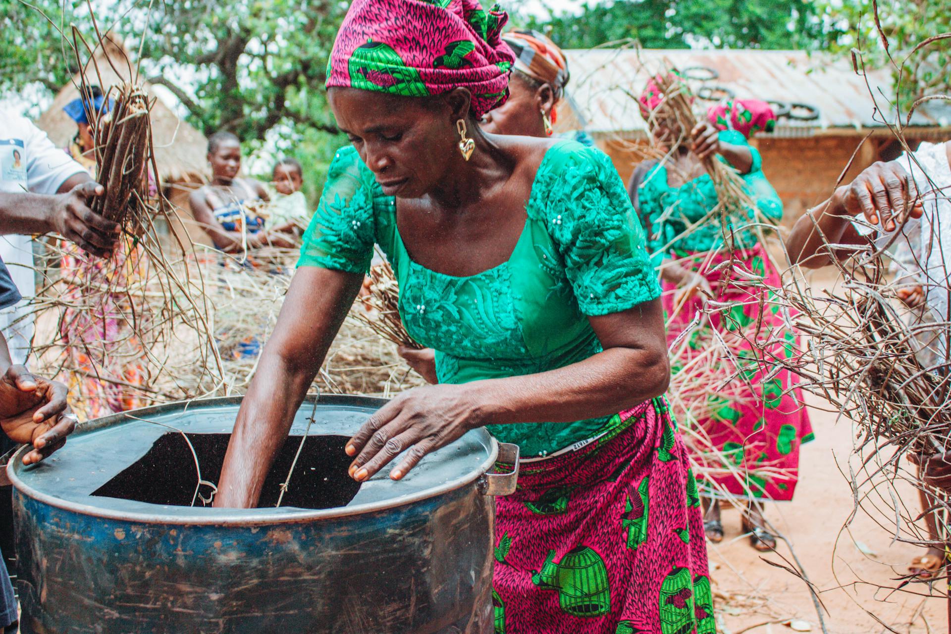 Woman Putting Hand in Hole Made in Barrel