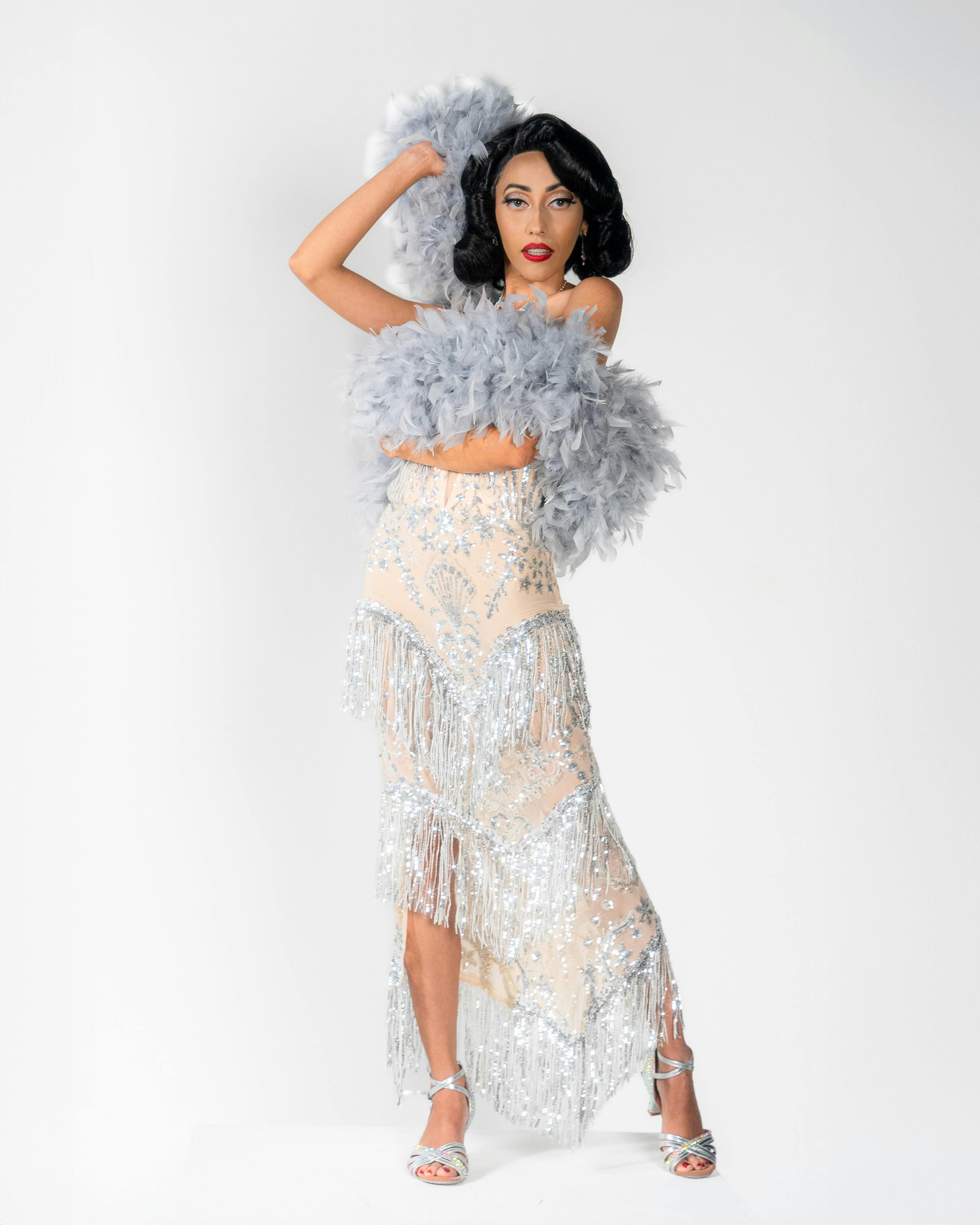 Dancer in Dress with Feather Boa · Free Stock Photo