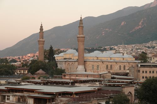 Free Explore the stunning architecture and landscape surrounding the Grand Mosque in Bursa, Turkey. Stock Photo