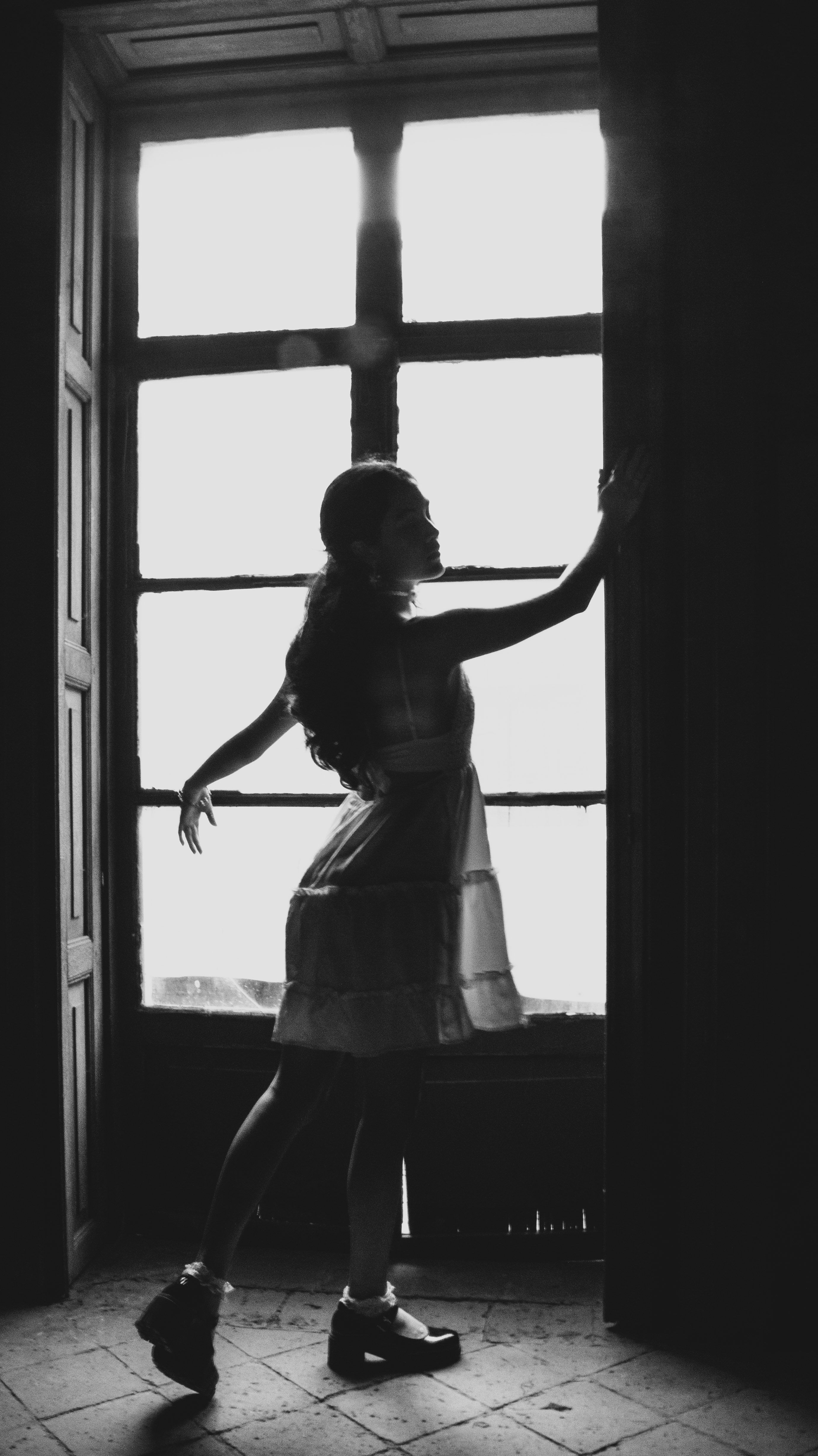 Woman Posing in Darkness near Windows · Free Stock Photo