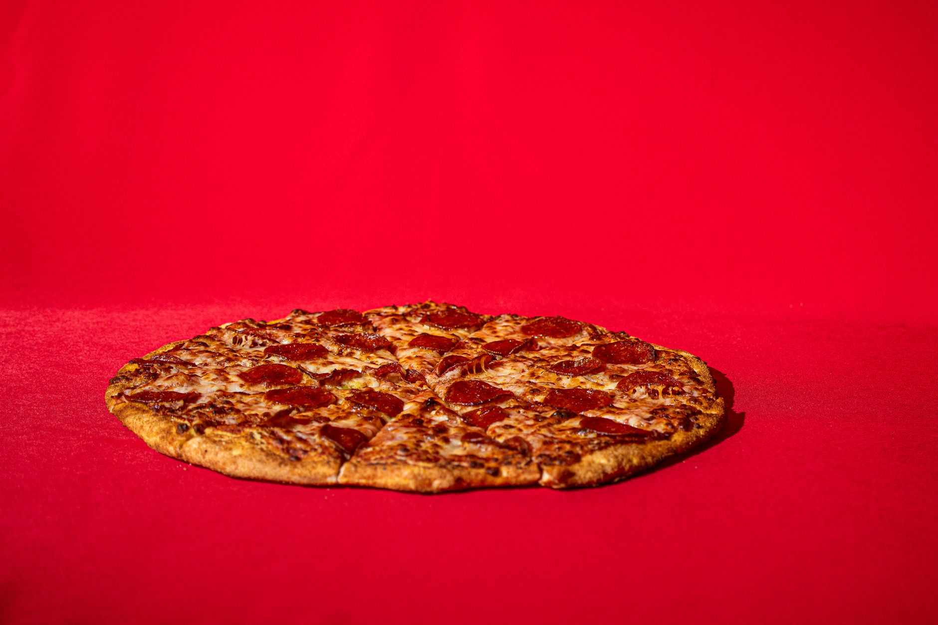 Thin ‘N Crispy Pizza Hut crust slice showing dryness