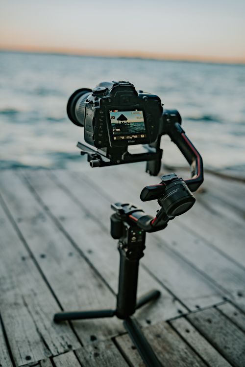 Camera on Sea Shore · Free Stock Photo