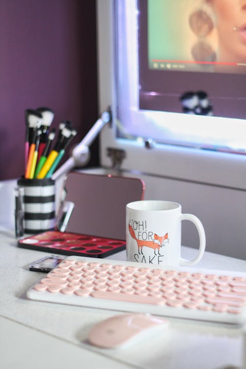 Free Cup Beside Keyboard Stock Photo