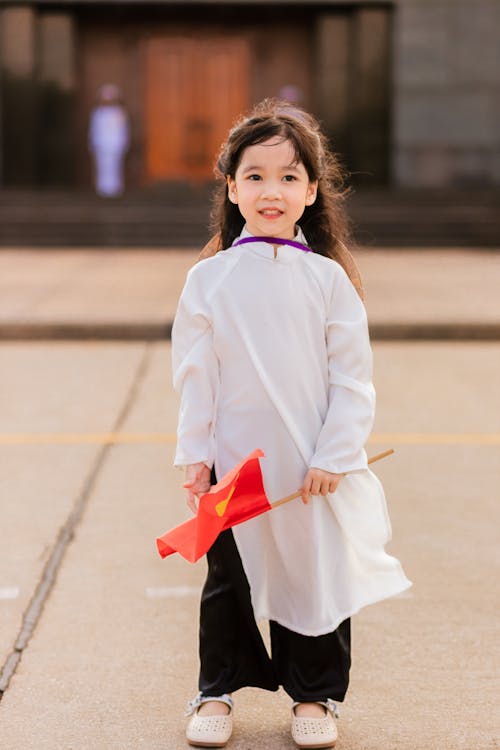 Little Girl with Chinese Flag in her Hand 