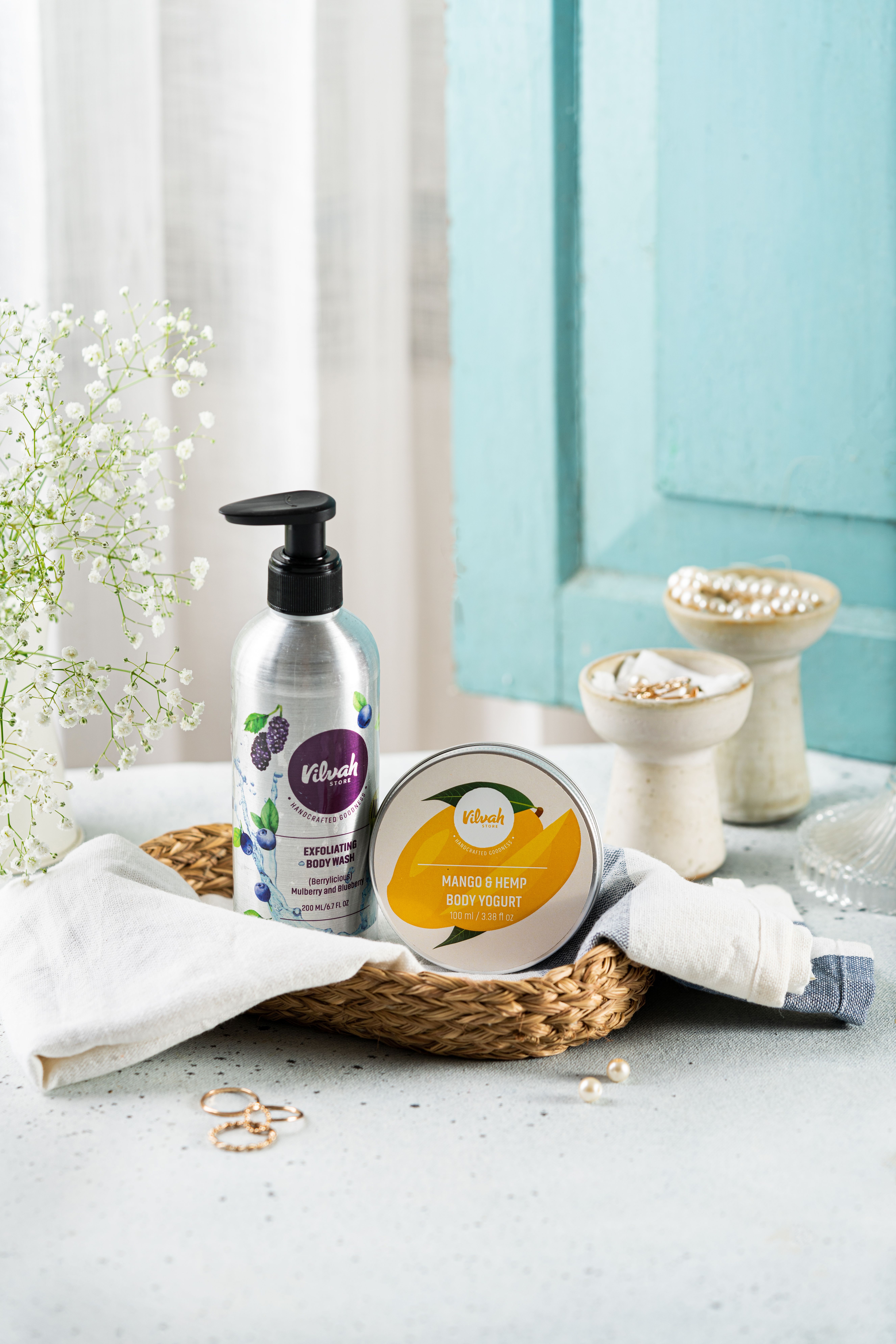 Sophisticated skincare set featuring a lotion and body yogurt in a chic arrangement.