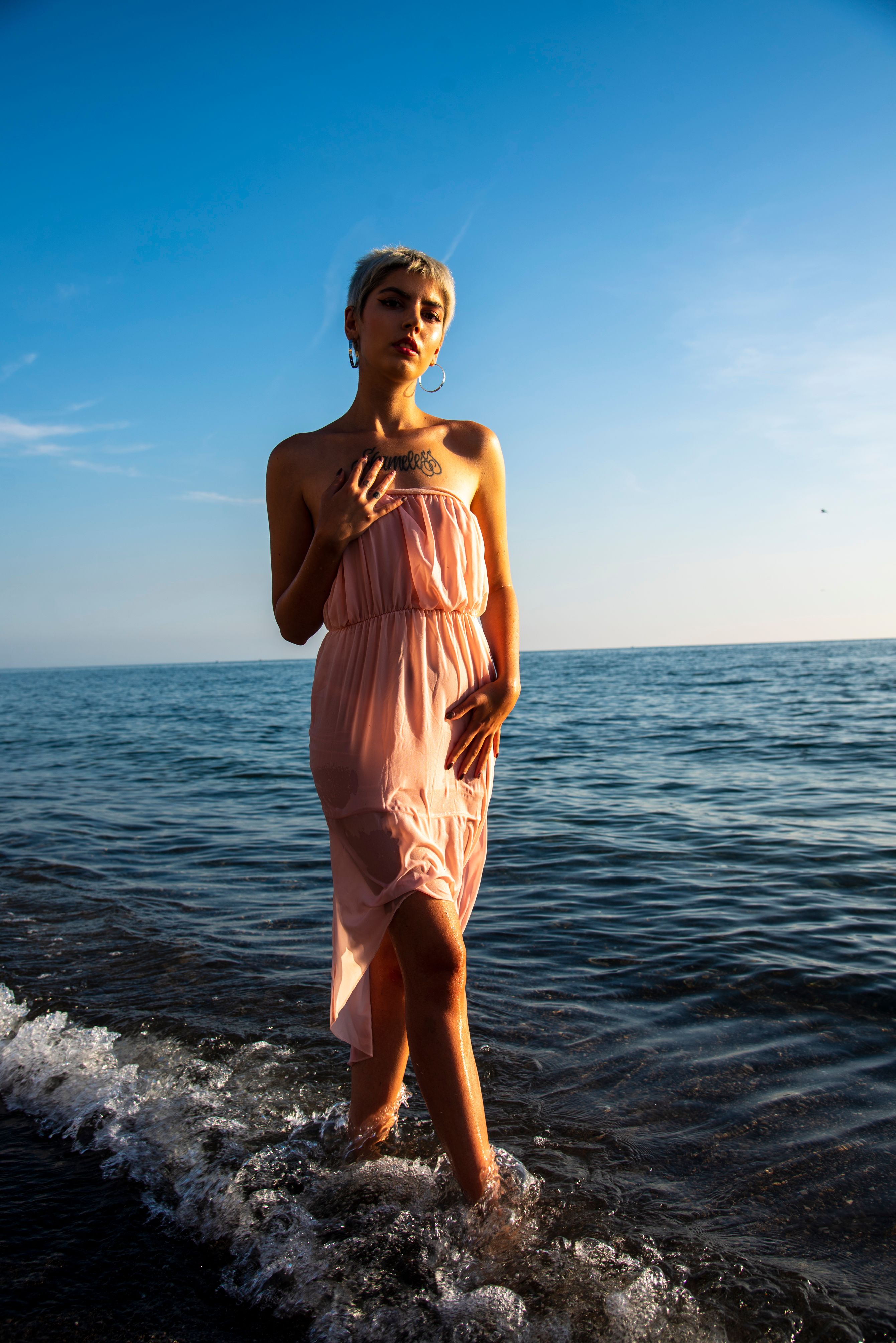 Woman Wearing Dress on a Beach · Free Stock Photo