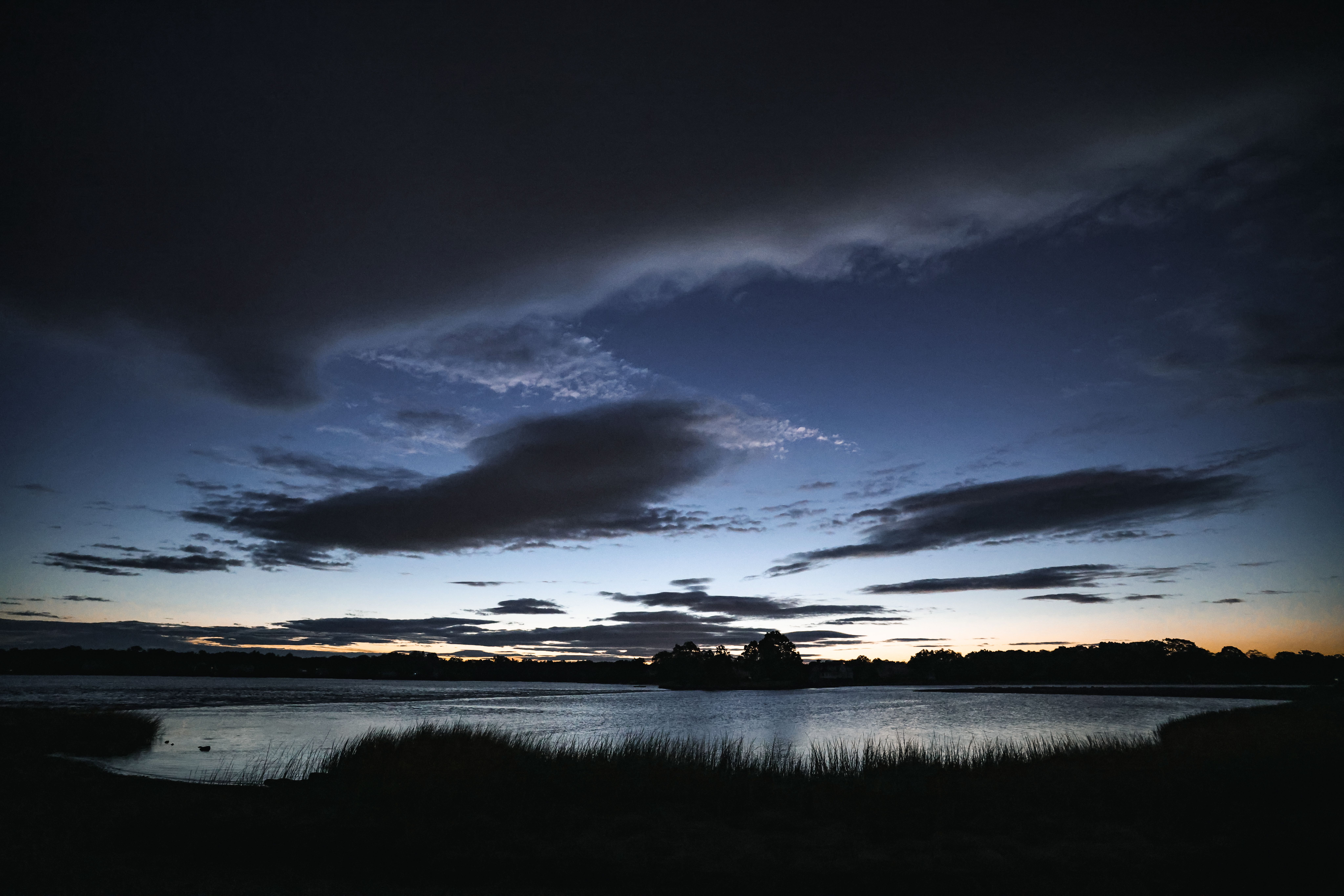 Clouds over Lake at Sunset · Free Stock Photo