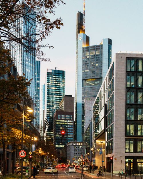 Free Stunning view of Frankfurt skyline featuring iconic skyscrapers and city lights during twilight. Stock Photo