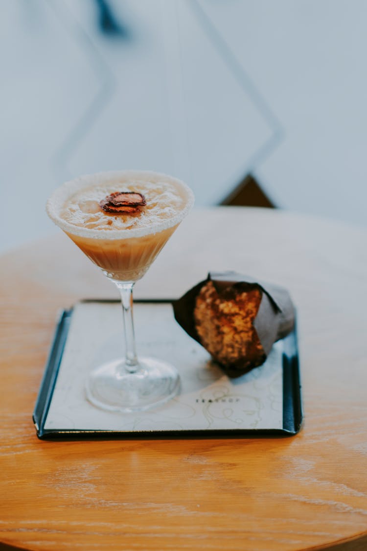 Cocktail And A Muffin On A Tray 