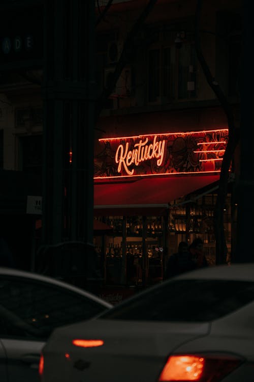 Red Neon Light on Road Bar Facade