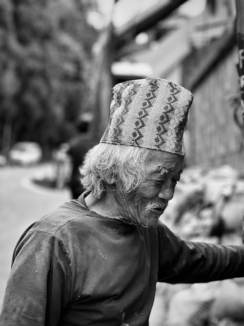 Elderly Man in Traditional Hat