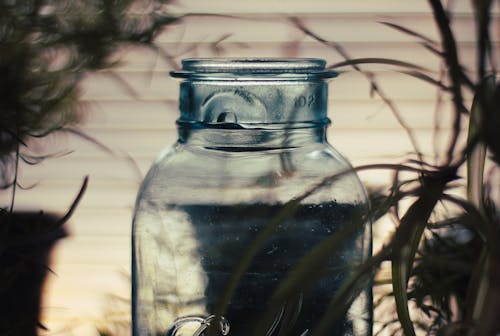 Empty Glass Jar by Window