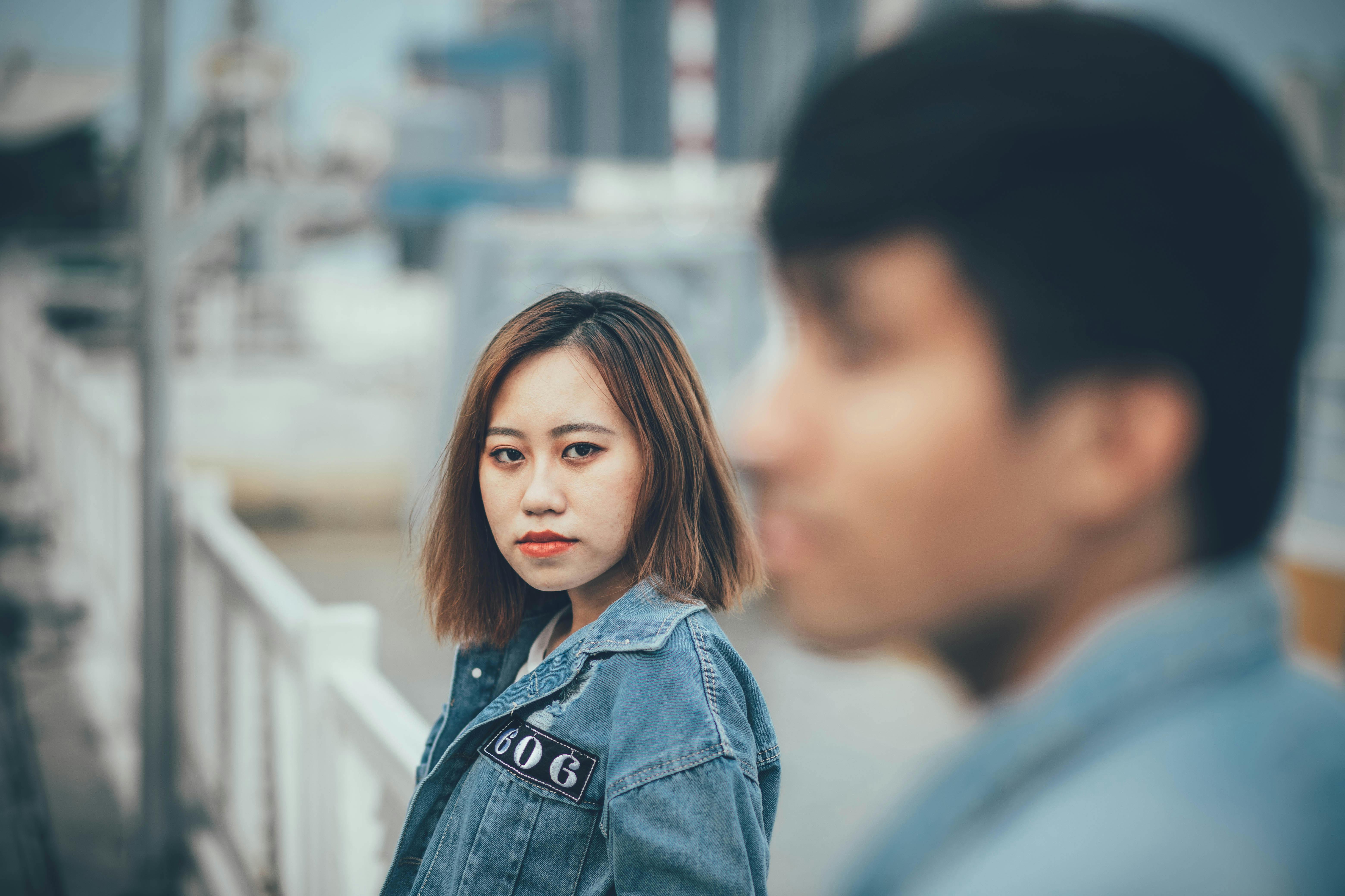 Young Woman in Denim Jacket Portrait Outdoors