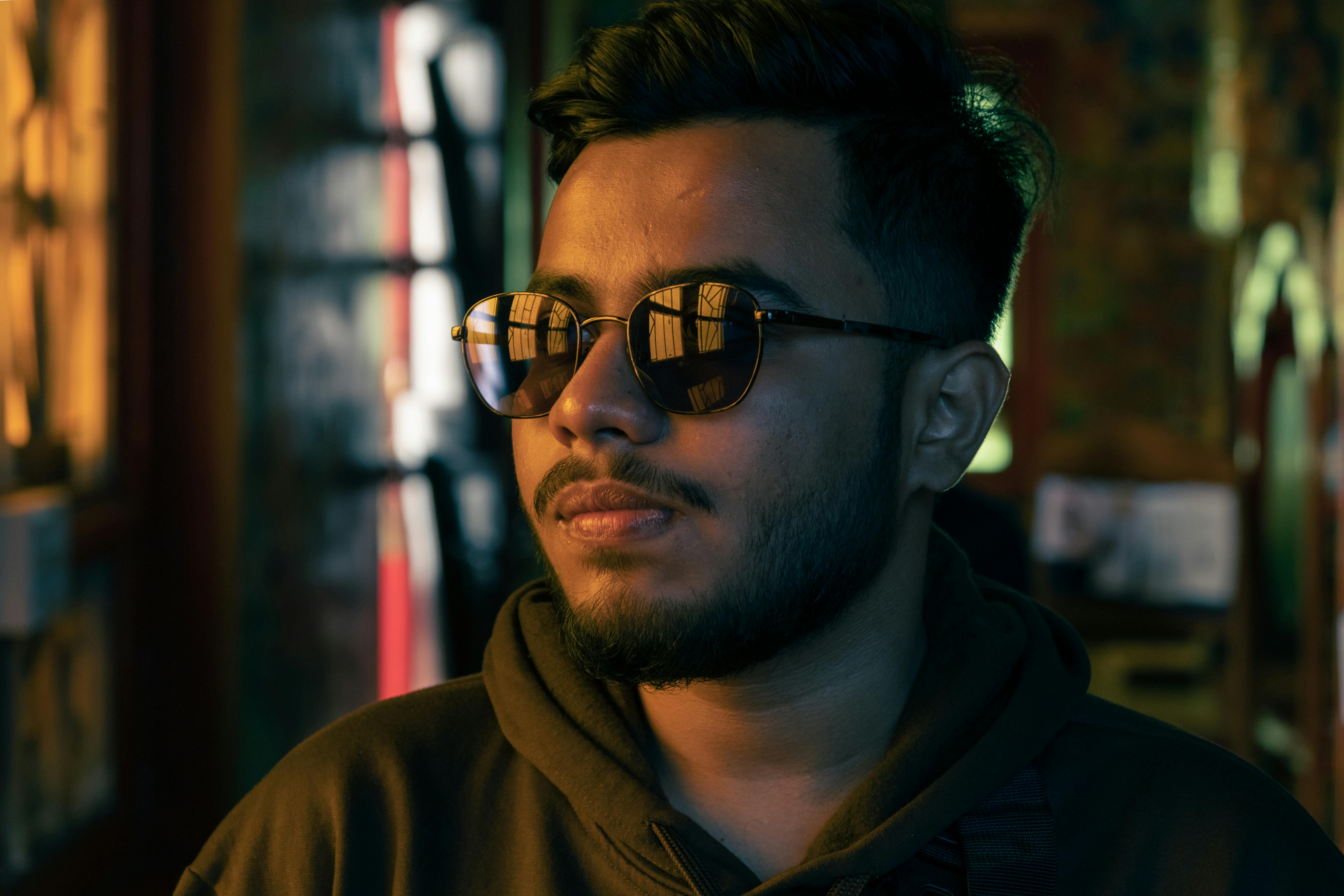 Lexica - Closeup of a beautiful black woman wearing sunglasses in front of  a blurred supermarket at night, dramatic lighting, intricate designs,  orna...