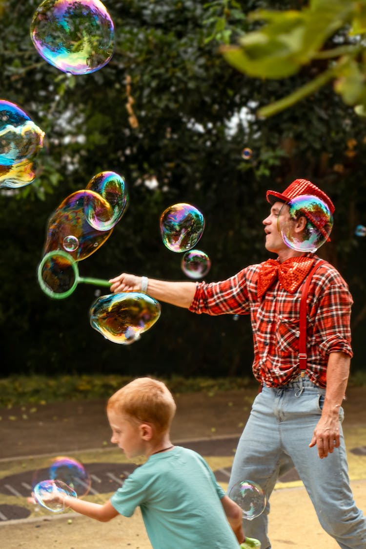 Father And Son Blowing Bubbles