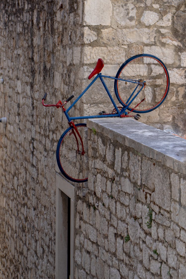 Bicycle And Stone Wall