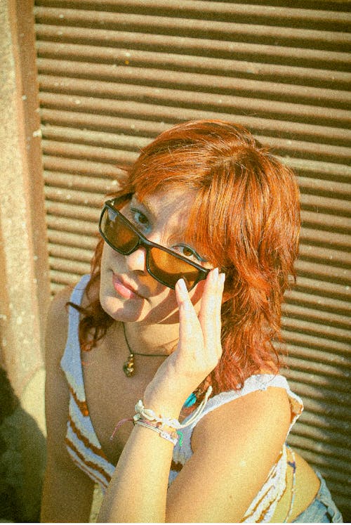 Redhead Woman in Sunglasses
