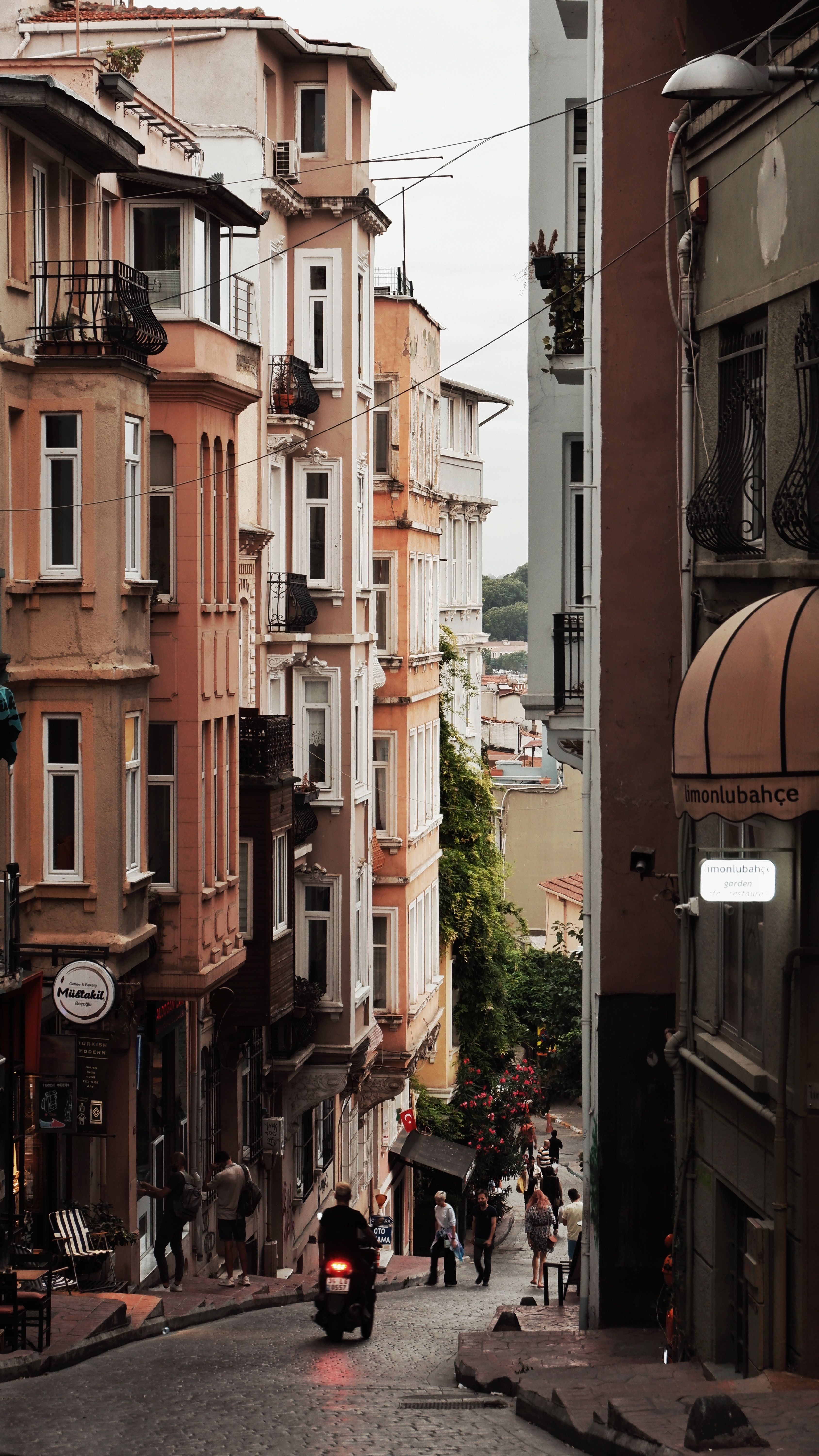 A Narrow Alley between Traditional Apartment Buildings · Free Stock Photo