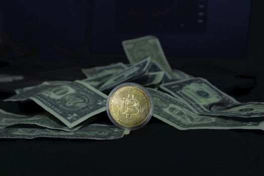 Close-up of a Bitcoin coin and US dollar bills, highlighting cryptocurrency and finance.