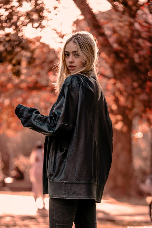 Woman Wearing Leather Jacket in a Park · Free Stock Photo