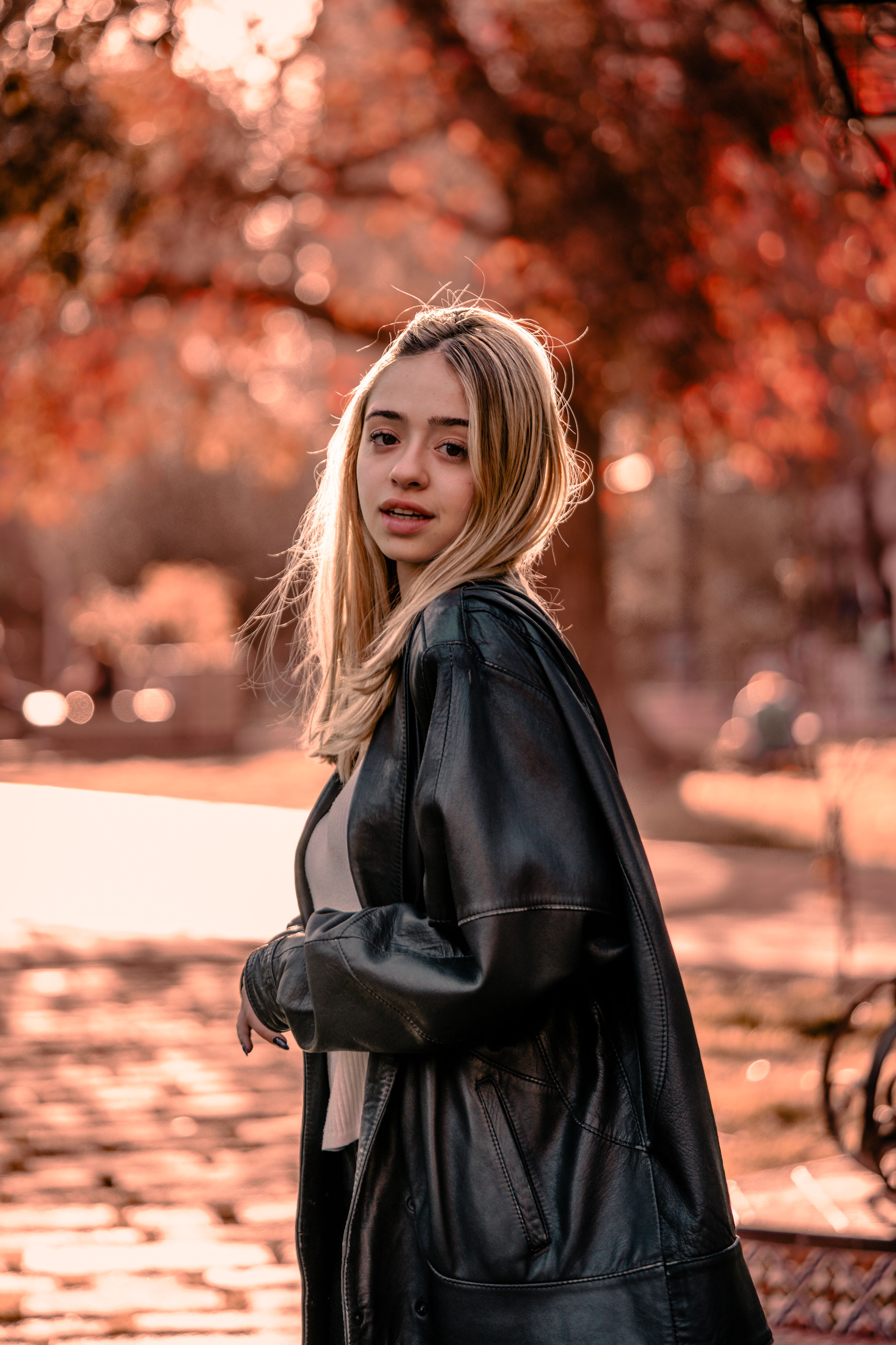 Woman Wearing Leather Jacket in a Park · Free Stock Photo