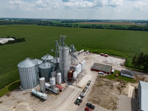 Silos Surrounded by Fields