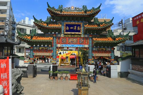 Free Vibrant traditional Chinese gate in Yokohama Chinatown, Japan captures cultural essence. Stock Photo