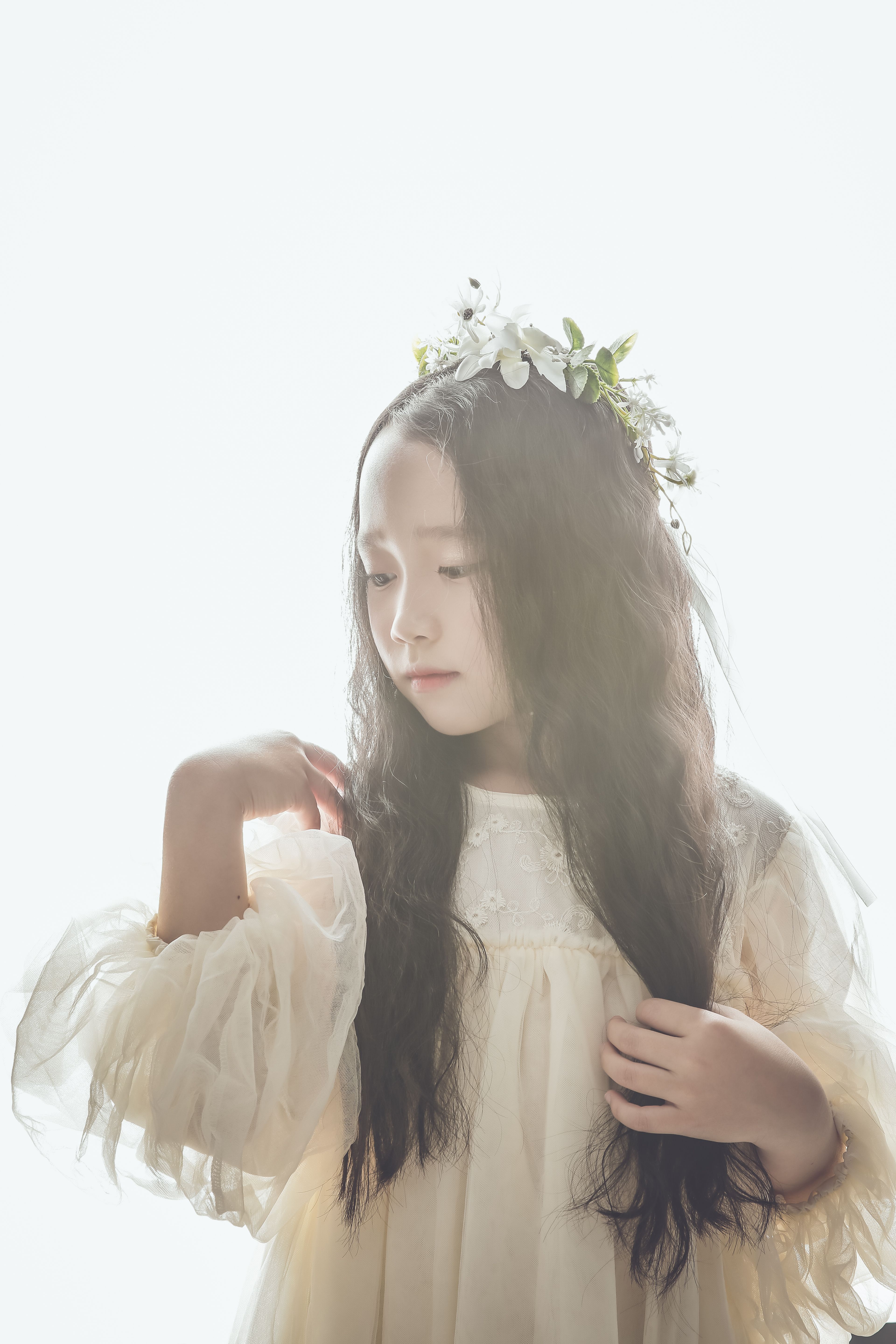 Girl with Long Hair, Posing in a White Dress and a Wreath · Free Stock ...