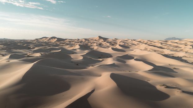 Stunning aerial shot of Samalayuca sand dunes capturing the vast arid landscape.