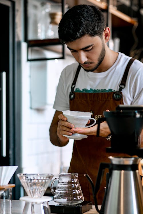 Free A Barista Preparing the Coffee Stock Photo