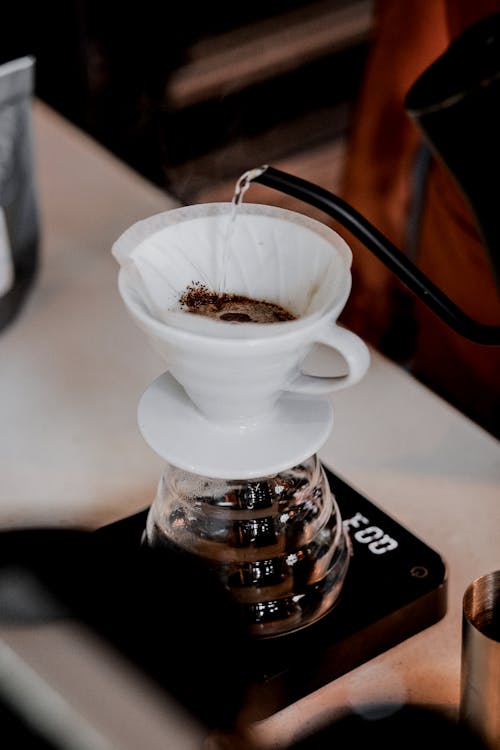 Free Close-up of a Glass Coffeepot with a Coffee Filter  Stock Photo