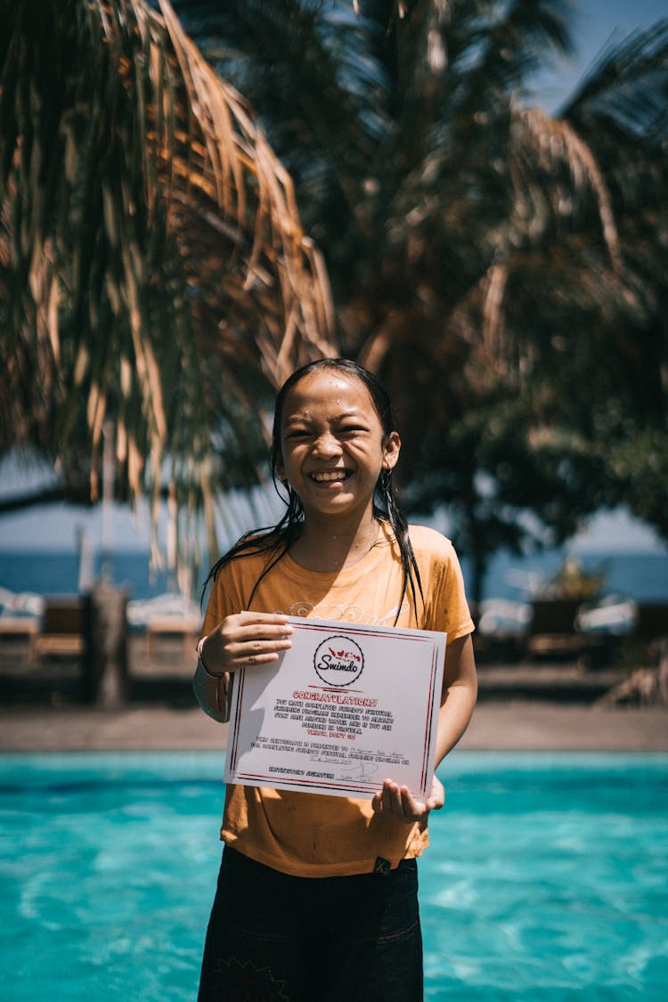 Girl Holding A Certificate