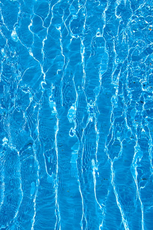 Close-up of the Surface of Bright Blue Water 