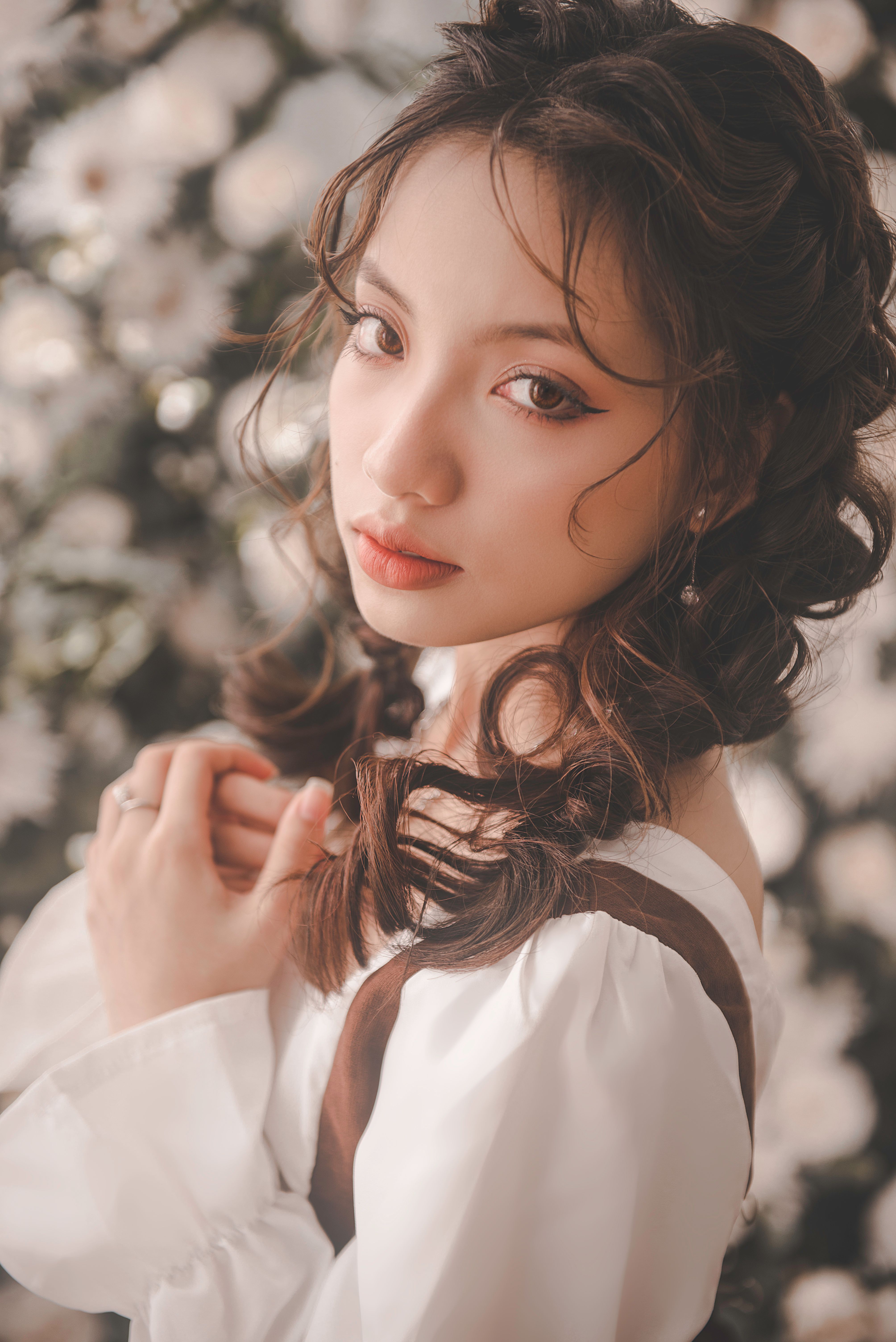 Portrait of Young Brunette Woman in White Blouse · Free Stock Photo