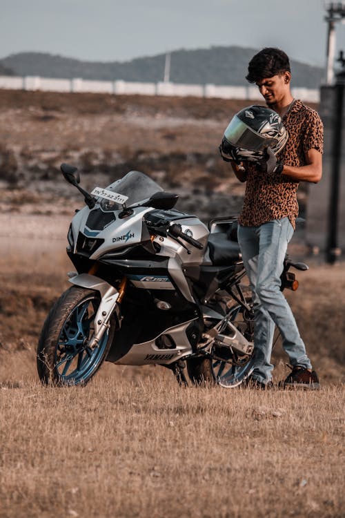 Man with Motorcycle Off Road