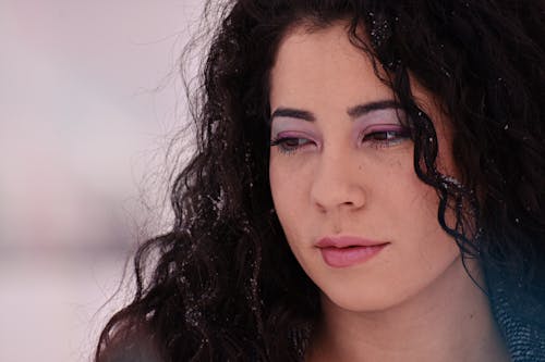 Free Close-Up Photo of Woman With Curly Hair Stock Photo